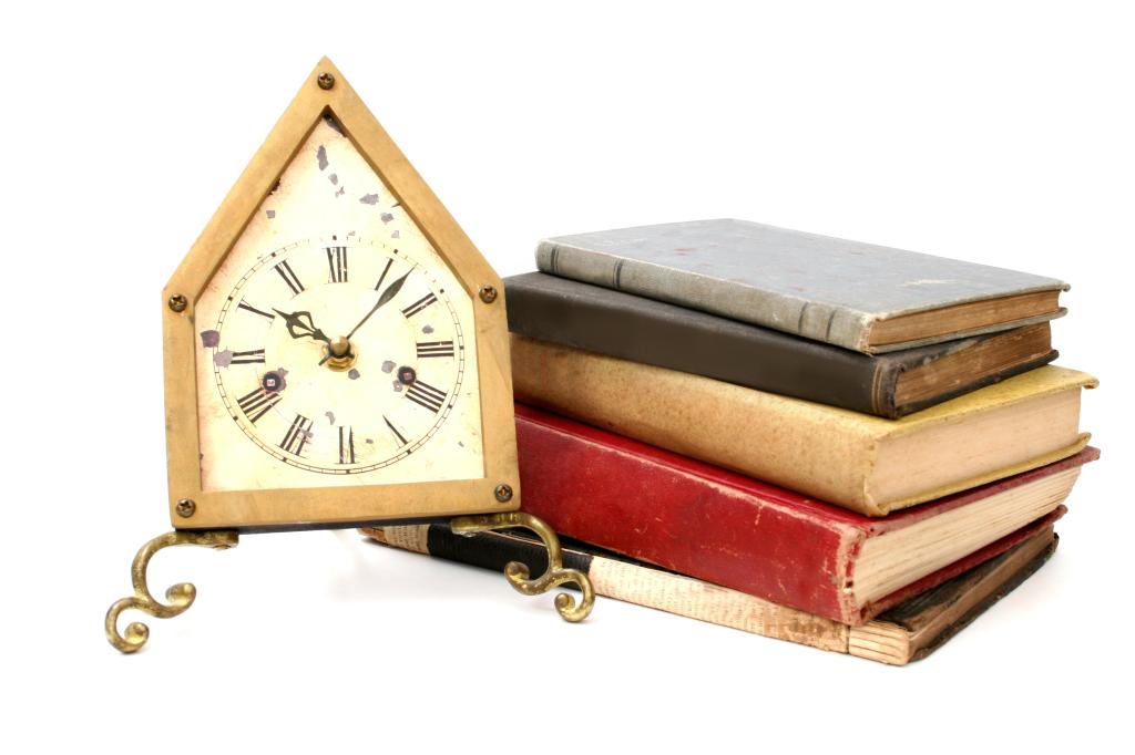 Clock and a stack of books; Develolp a realistic sense of time